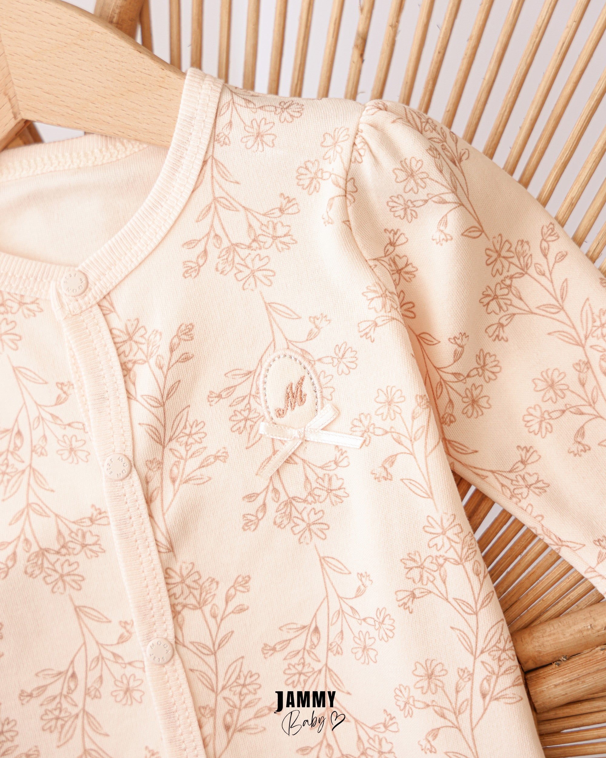Minimal Floral Footed Baby Romper – Cream